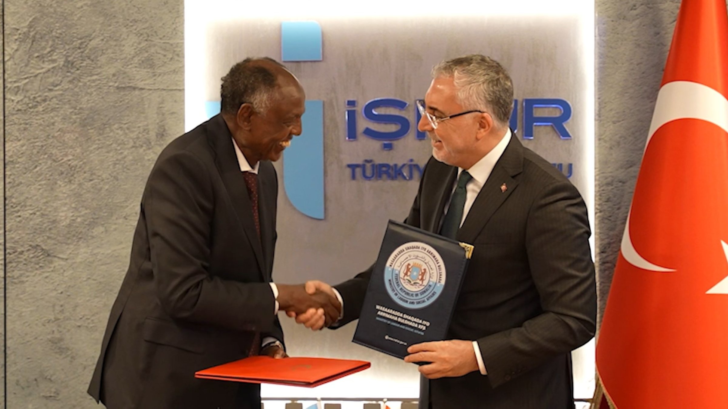Labor and Social Security Minister Vedat Işıkhan shakes hands with Somali Labor and Social Affairs Minister Salim Alio Ibro, Ankara, Türkiye, Jan. 13, 2026. (DHA Photo)