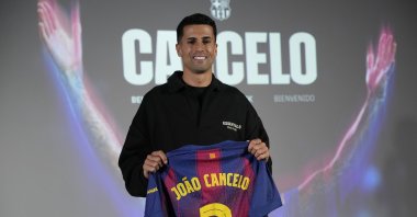 Portuguese defender Joao Cancelo poses during his presentation as FC Barcelona's new player, Barcelona, Spain, Jan. 13, 2026. (EPA Photo)