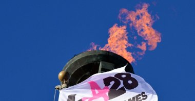 The LA28 Olympic cauldron is lit during a ceremonial lighting at the Memorial Coliseum ahead of the launch of ticket registration for the 2028 Summer Olympic Games, Los Angeles, U.S., Jan. 13, 2026. (AFP Photo)