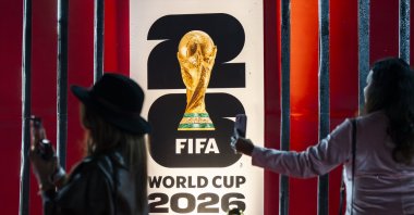 The FIFA World Cup trophy is displayed as part of a special tour ahead of the 2026 tournament to be hosted by the United States, Canada and Mexico, with football fans gathering to view the trophy and pose for photographs, Guwahati, India, Jan. 13, 2026. (AA Photo)