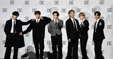 South Korean K-pop boy band BTS members (L to R) V, Jin, Jung Kook, RM, Jimin and J-Hope pose for a photo session during a press conference on BTS new album "BE (Deluxe Edition)," Seoul, South Korea, Nov. 20, 2020. (AFP Photo)