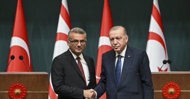 President Recep Tayyip Erdoğan and TRNC President Tufan Erhürman shake hands after a joint news conference, Ankara, Türkiye, Nov. 13, 2025. (AA Photo)
