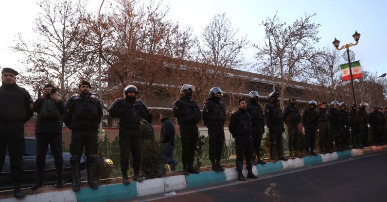 Members of the Iranian police stand guard at a protest in front of the British Embassy following anti-government protests, Tehran, Iran, Jan.14, 2026. (WANA via Reuters)