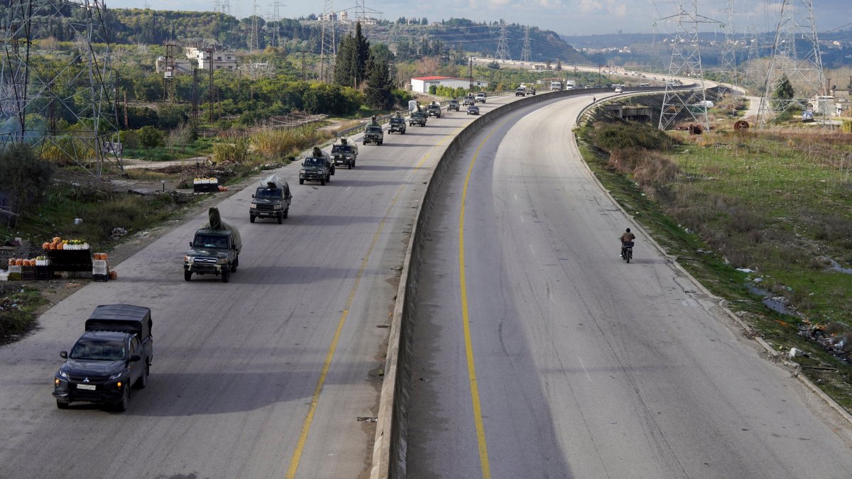 Military vehicles drive along a road, as Syrian state agency, SANA, reported that the Syrian army sent reinforcements from Latakia to army forces, amid escalating YPG threats, Latakia, Syria, Jan. 14, 2026. (Reuters Photo)