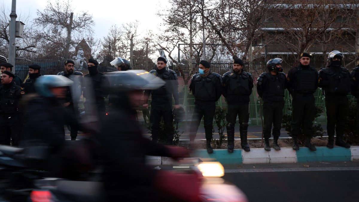 Iranian riot police stand guard as pro-government students protest in front of the British Embassy in Tehran, Iran, Jan. 14, 2026. (EPA Photo)