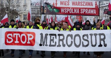 Polish farmers hold a banner as they protest against the Mercosur trade deal in the center of Warsaw, Poland, Jan. 9, 2026. (Reuters Photo)