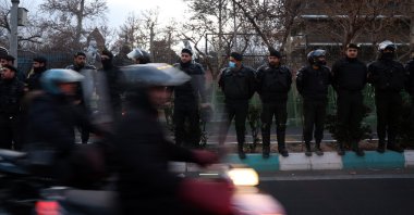Iranian riot police stand guard as pro-government students protest in front of the British Embassy in Tehran, Iran, Jan. 14, 2026. (EPA Photo)