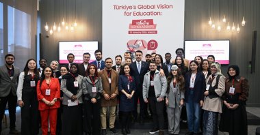 Students pose for a group photo with YTB President Abdulhadi Turus during the official launch event of the 2026 Türkiye Scholarships program, Ankara, Türkiye, Jan. 15, 2025. (AA Photo) 