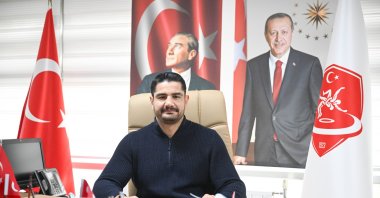 Turkish Wrestling Federation President Taha Akgül poses for a photo after an interview with Anadolu Agency (AA), Ankara, Türkiye, Jan. 13, 2026. (AA Photo)