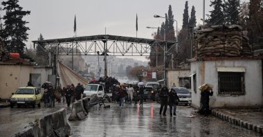 Residents of the Sheikh Maqsoud neighborhood leave the area through a humanitarian corridor opened by the Syrian government, Aleppo, northern Syria, Jan. 9, 2026. (EPA Photo)
