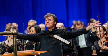 This image released by the Royal Opera shows Jakub Hrusa during a performance with the Royal Opera Chorus and Orchestra of the Royal Opera House, London, U.K., Sept. 20, 2025. (AP Photo)