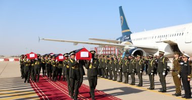 Soldiers carry the flag-draped caskets of Libya's army chief of staff, Mohammed Ali Ahmed al-Haddad, and seven other officials killed in the plane crash, Tripoli, Libya, Dec. 27, 2025. (Reuters Photo)