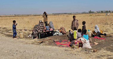 Displaced Sudanese react after spending a night in al-Qadarif, eastern Sudan, Dec. 26, 2025. (AFP Photo)