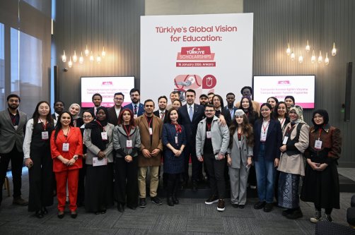 Students pose for a group photo with YTB President Abdulhadi Turus during the official launch event of the 2026 Türkiye Scholarships program, Ankara, Türkiye, Jan. 15, 2025. (AA Photo) 