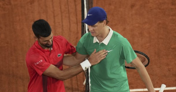 Winner Italy's Jannik Sinner (R) and Serbia's Novak Djokovic greet each other after their semifinal match of the French Tennis Open at the Roland-Garros stadium, Paris, France, June 6, 2025. (AP Photo)