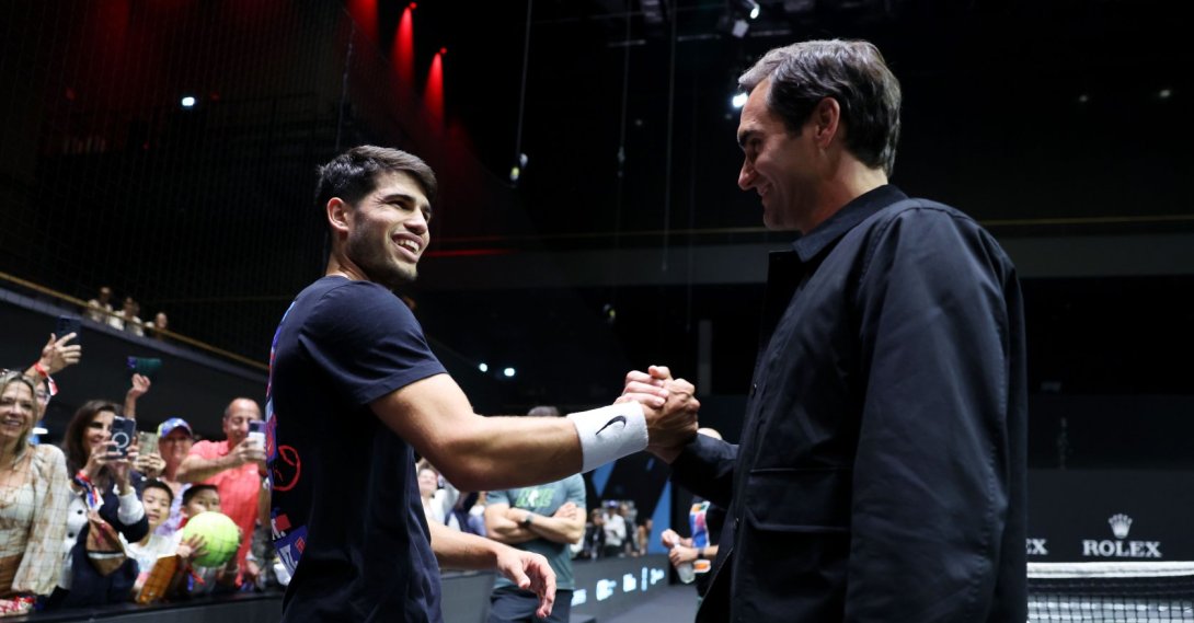  Roger Federer (R) and Carlos Alcaraz of Team Europe shake hands during a Team Europe Practice Session on the practice court on day one of Laver Cup at Uber Arena, Berlin, Germany, Sept. 20, 2024. (Getty Images Photo)