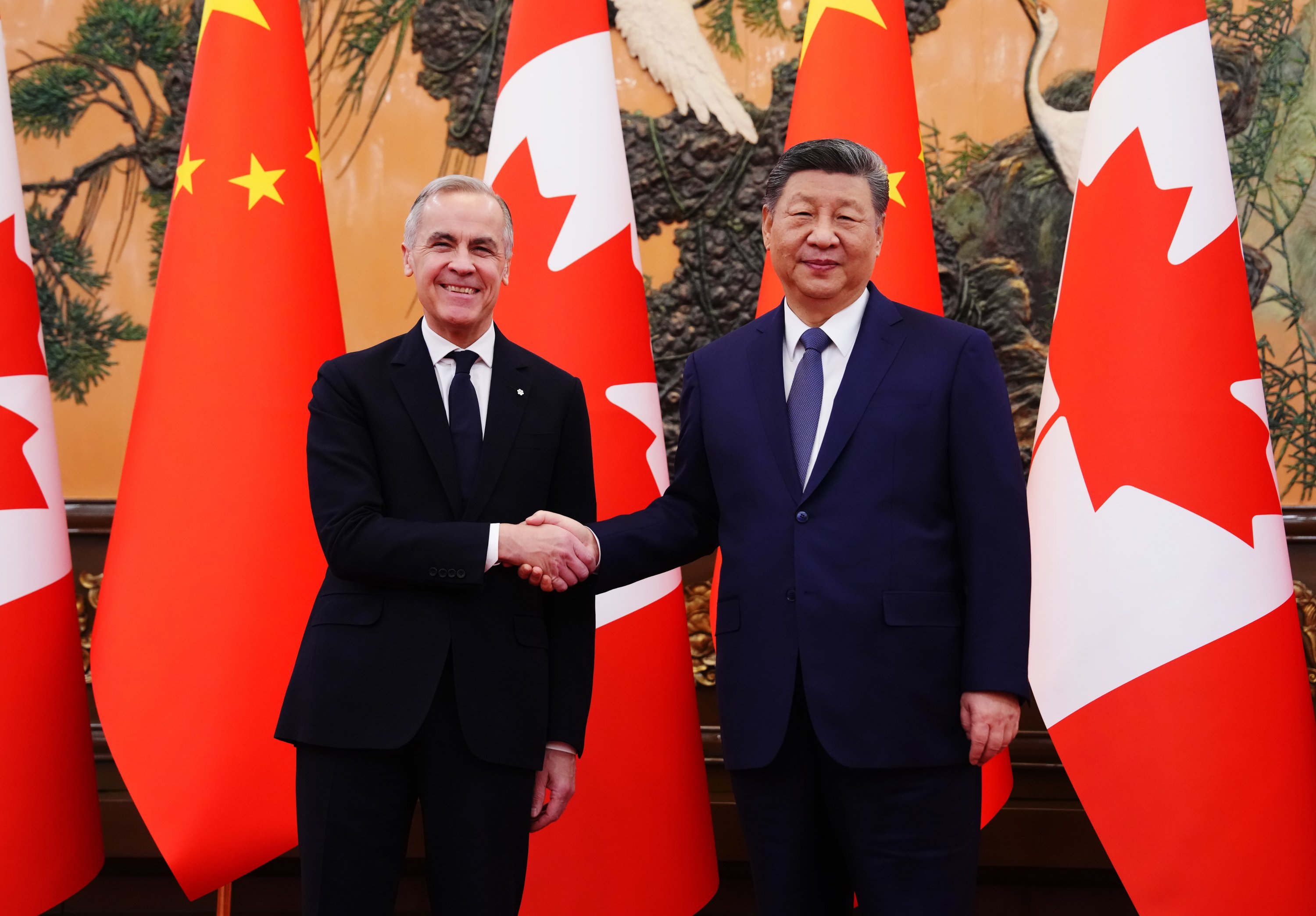 Canada, China agree 'landmark' deal to cut EV, farm product tariffs