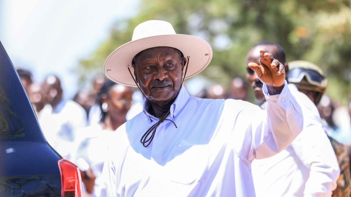 Incumbent president and National Resistance Movement (NRM) presidential candidate Yoweri Museveni waves at supporters as he leaves after casting his ballot during the 2026 general elections, Rwakitura, Uganda, Jan. 15, 2026. (AFP Photo)