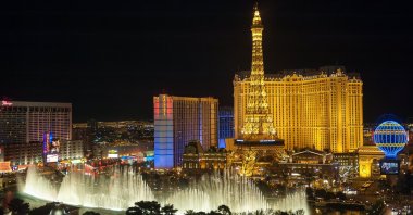 Bellagio Fountains and Paris Las Vegas on the Las Vegas Strip at night in Las Vegas, Nevada, U.S., April 7, 2011. (Shutterstock Photo)