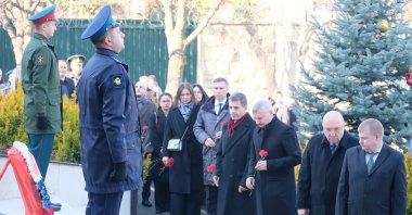Members of the Russian Embassy attend a ceremony marking the ninth anniversary of the killing of Russian Ambassador Andrey Karlov Ankara, Türkiye, Dec. 19, 2025. (IHA Photo)