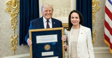 U.S. President Trump (L) meets with Venezuelan opposition leader Maria Corina Machado in the Oval Office, during which she presented the President with her Nobel Peace Prize, Washington, U.S., Jan. 15, 2026. (Reuters Photo)