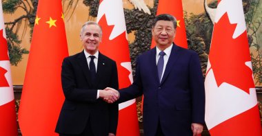 Canada's Prime Minister Mark Carney (L) meets with Chinese President Xi Jinping at the Great Hall of the People, Beijing, China, Jan. 16, 2026. (AP Photo)