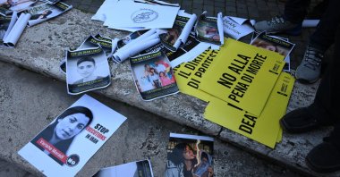 Posters are seen during a demonstration in solidarity with anti-government mass protests in Iran, at the Campidoglio square in Rome, Italy, Jan. 16, 2026. (EPA Photo)