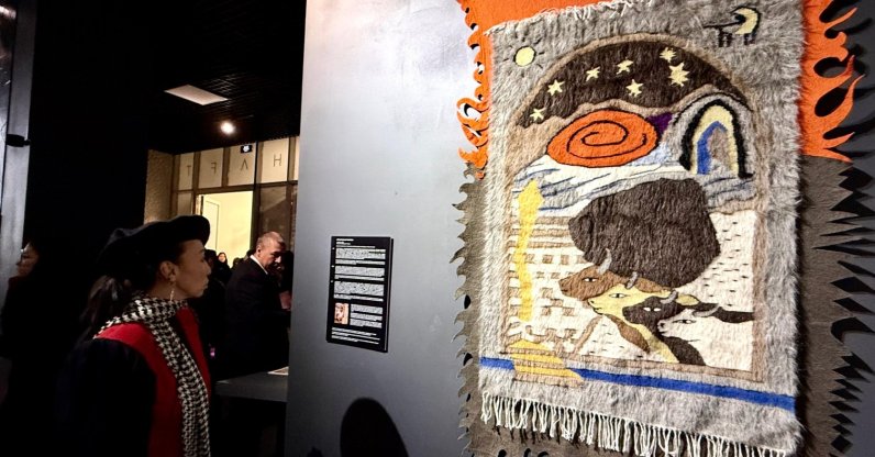 A visitor explores the “SHAFT. Unearthing Hidden Threads” exhibition, Astana, Kazakhstan, Jan. 14, 2026. (AA Photo)