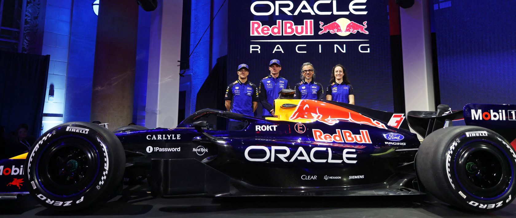 (L-R) Oracle Red Bull Racing's Isack Hadjar, Max Verstappen, Laurent Mekies and Alisha Palmowski unveil their livery on stage during the Red Bull Racing season launch at Michigan Central Station, Detroit, U.S., Jan. 15, 2026. (AFP Photo)
