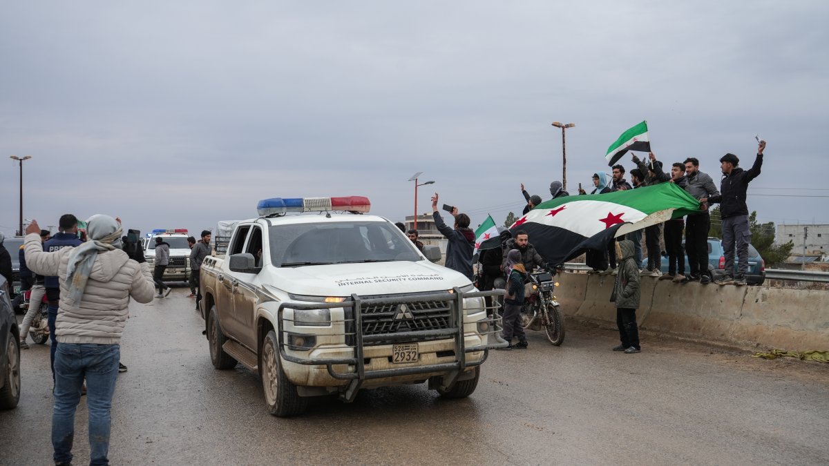 People celebrate the entry of Syrian army forces into the Deir Hafer area after the withdrawal of the YPG terrorists in Deir Hafer, eastern Aleppo countryside, Syria, Jan. 17, 2026. (EPA Photo)