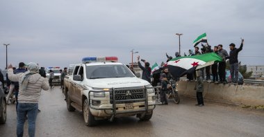 People celebrate the entry of Syrian army forces into the Deir Hafer area after the withdrawal of the YPG terrorists in Deir Hafer, eastern Aleppo countryside, Syria, Jan. 17, 2026. (EPA Photo)
