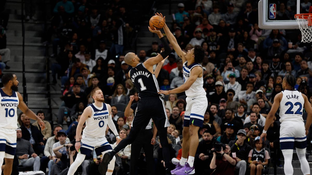 Joan Beringer of the Minnesota Timberwolves blocks shot of Victor Wembanyama of the San Antonio Spurs in the first half at Frost Bank Center, San Antonio, Texas, U.S., Jan. 17, 2026. (AFP Photo)