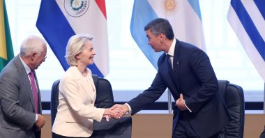 European Commission President Ursula von der Leyen (L) and Paraguayan President Santiago Pena (R) greet each other at the signing ceremony of the free trade agreement between the EU and the Mercosur countries, Asuncion, Paraguay, Jan. 17, 2026. (EPA Photo)