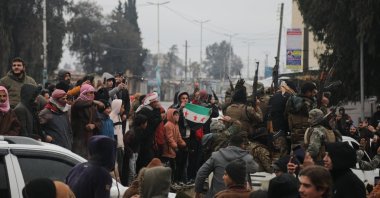 Following the withdrawal of the terrorist organization YPG from the region, families return to their homes in convoys and celebrate, Deir Hafir, Syria, Jan. 18, 2025. (AA Photo)
