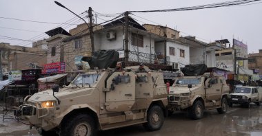 Syrian army military vehicles are deployed inside the city of Tabqa, Syria, Jan. 18, 2026. (Reuters Photo) 