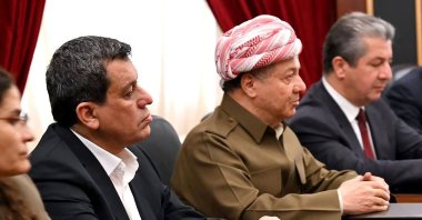YPG ringleader Ferhat Abdi Şahin (L) sits next to Iraqi Kurdish politician Massoud Barzani (2nd L) during a meeting, Irbil, Iraq, Jan. 17, 2026. (AFP Photo)