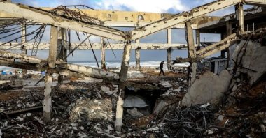 A Palestinian inspects a collapsed building due to the storm in Gaza City, Palestine, Jan. 13, 2026. (Xinhua Photo)