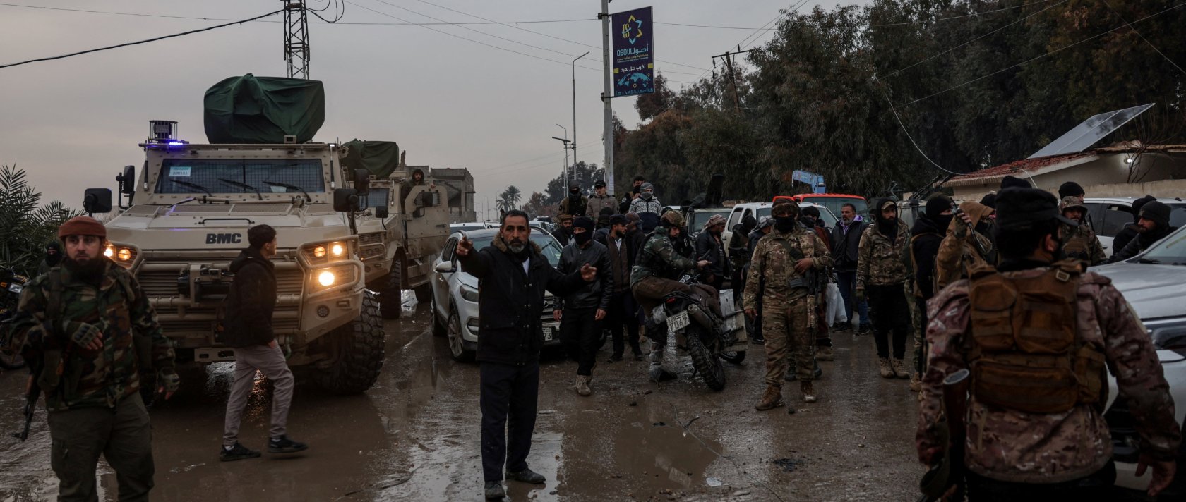 Military personnel gather, after the Syrian Democratic Forces (SDF) withdrew from the Deir el-Zour province and the Syrian army took full control over the area, in Deir el-Zour, Syria, Jan. 18, 2026. (Reuters Photo)