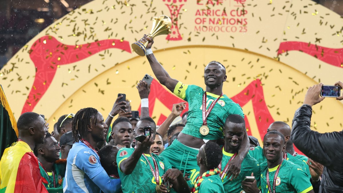 Senegal's Sadio Mane holds the trophy after the Africa Cup of Nations (AFCON) final football match against Morocco at the Prince Moulay Abdellah Stadium, Rabat, Jan. 18, 2026. (AA Photo)