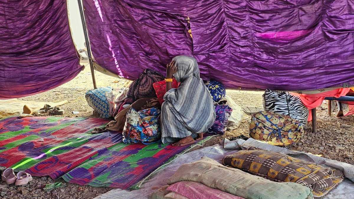 A young displaced Sudanese girl reacts after spending a night with others after the Rapid Support Forces (RSF) took control of the Heglig area, Gedaref, Sudan, Dec. 26, 2025. (AFP Photo)