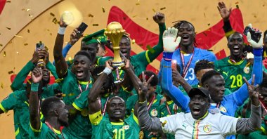 Senegal's Sadio Mane holds the trophy after the Africa Cup of Nations (AFCON) final football match against Morocco at the Prince Moulay Abdellah Stadium, Rabat, Jan. 18, 2026. (AFP Photo)