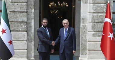 President Recep Tayyip Erdoğan shakes hands with Syrian President Ahmad al-Sharaa (R) during their meeting in Istanbul, Türkiye, May 24, 2025. (AP Photo)