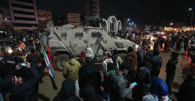 People celebrate as the Syrian forces enter the city of Raqqa, eastern Syria, Jan. 18, 2026. (EPA Photo)