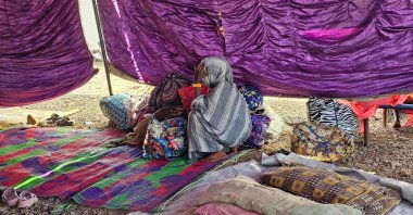 A young displaced Sudanese girl reacts after spending a night with others after the Rapid Support Forces (RSF) took control of the Heglig area, Gedaref, Sudan, Dec. 26, 2025. (AFP Photo)