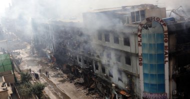 Smoke rises from Gul Plaza following a massive fire, Karachi, Pakistan, Jan. 19, 2026. (EPA Photo)
