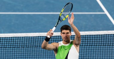 Spain's Carlos Alcaraz celebrates his victory over Adam Walton of Australia in the first round of the men’s singles at the Australian Open at Rod Laver Arena in Melbourne Park, Melbourne, Australia, Jan. 18, 2026. (Reuters Photo) 
