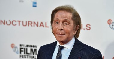Designer Valentino Garavani poses as he arrives for the gala screening of the film "Nocturnal Animals" during the 60th British Film Institute (BFI) London Film Festival at Leicester Square in London, Britain Oct. 14, 2016. (Reuters File Photo)