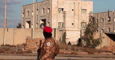 A member of Syrian military police stands guard near Raqqa prison, where the Syrian army is besieging SDF members after the army took control of the city of Raqqa, Syria Jan. 19, 2026. (Reuters Photo)