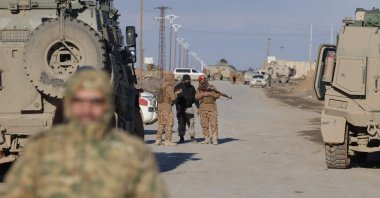 Syrian government forces take possession of an SDF military base as they enter the city of Raqqa, Syria, Jan. 19, 2026. (AFP Photo)