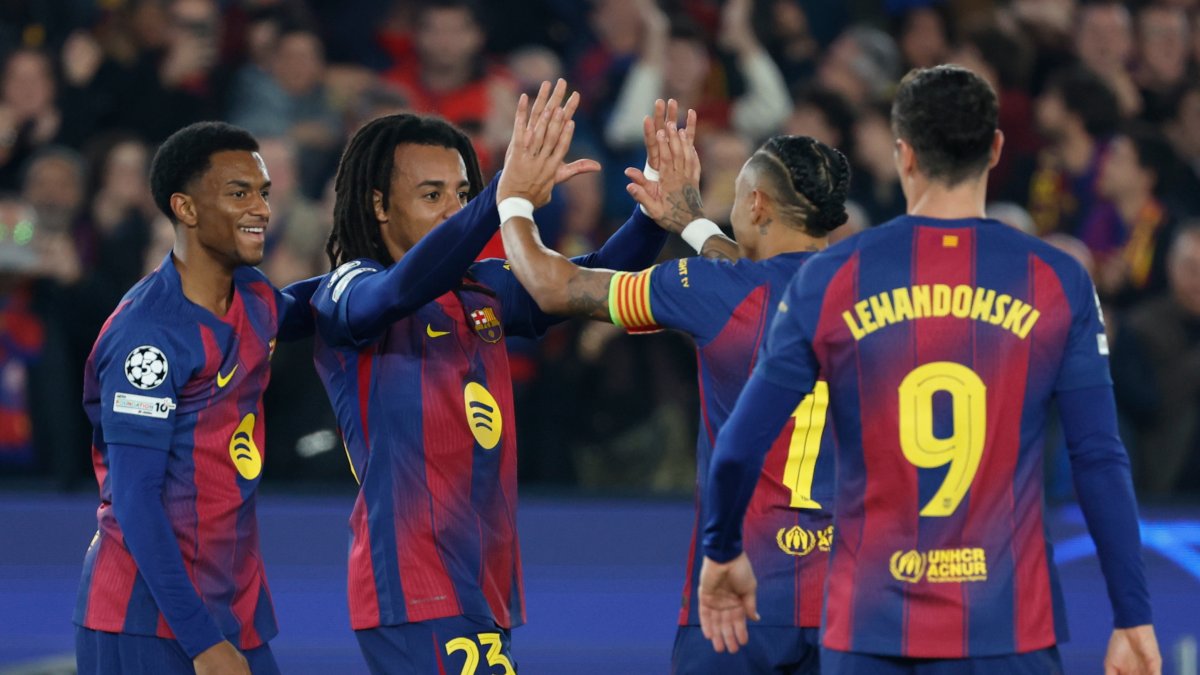 Barcelona's Jules Kounde (2nd L) celebrates with teammates after scoring his side's second goal during the Champions League opening phase match against Eintracht Frankfurt, Barcelona, Spain, Dec. 9, 2025. (AP Photo)